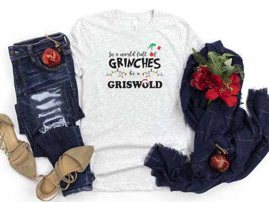 In a World Full of Grinches Tee